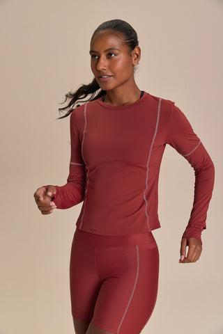 Long Sleeve Cut Out Clock Harmony Top