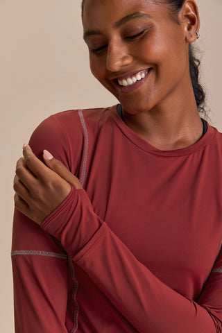 Long Sleeve Cut Out Clock Harmony Top