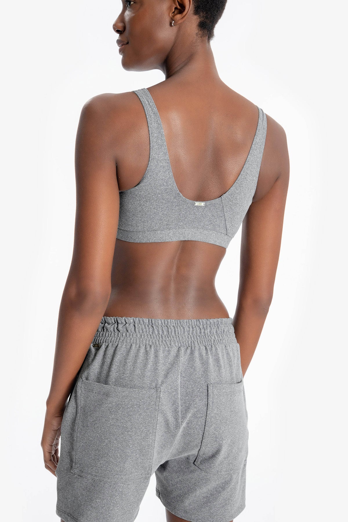 Essential Wellness Curve Top