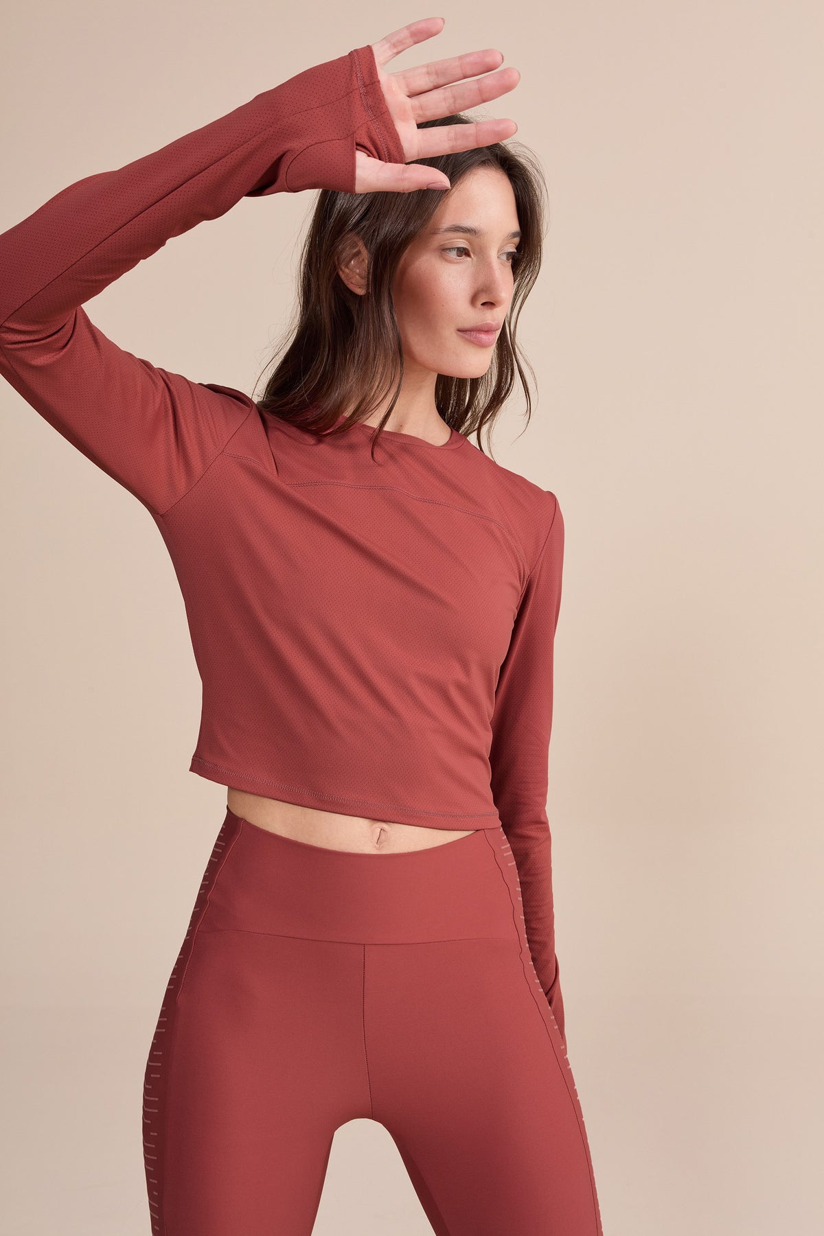 Action Skin® Cut Out Long Sleeve Top
