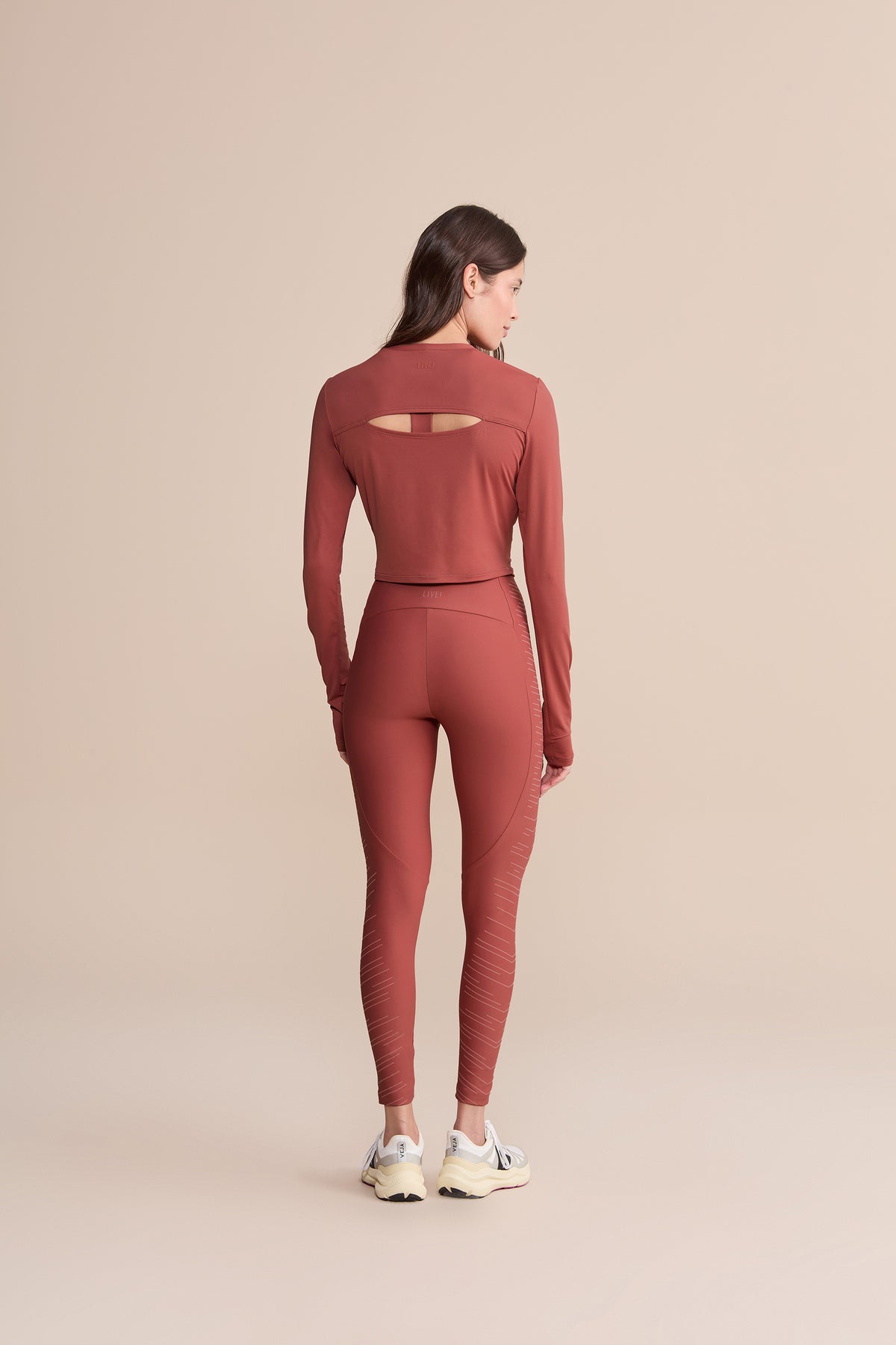 Action Skin® Cut Out Long Sleeve Top