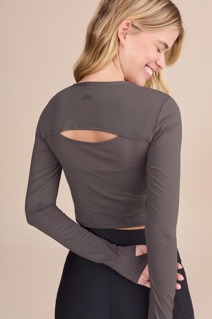 Action Skin® Cut Out Long Sleeve Top